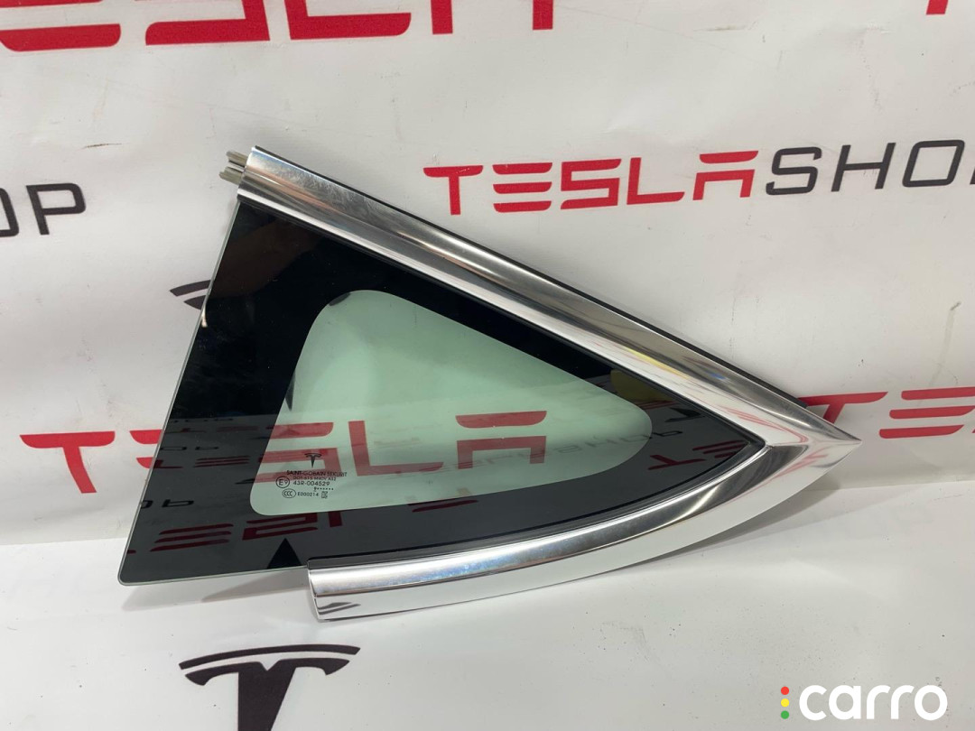 1080703-00- Форточка в заднее крыло Tesla Model 3 2019г. - фото №1