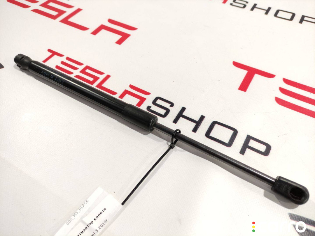 1091472-00-B Амортизатор капота Tesla Model 3 2019г. - фото №1