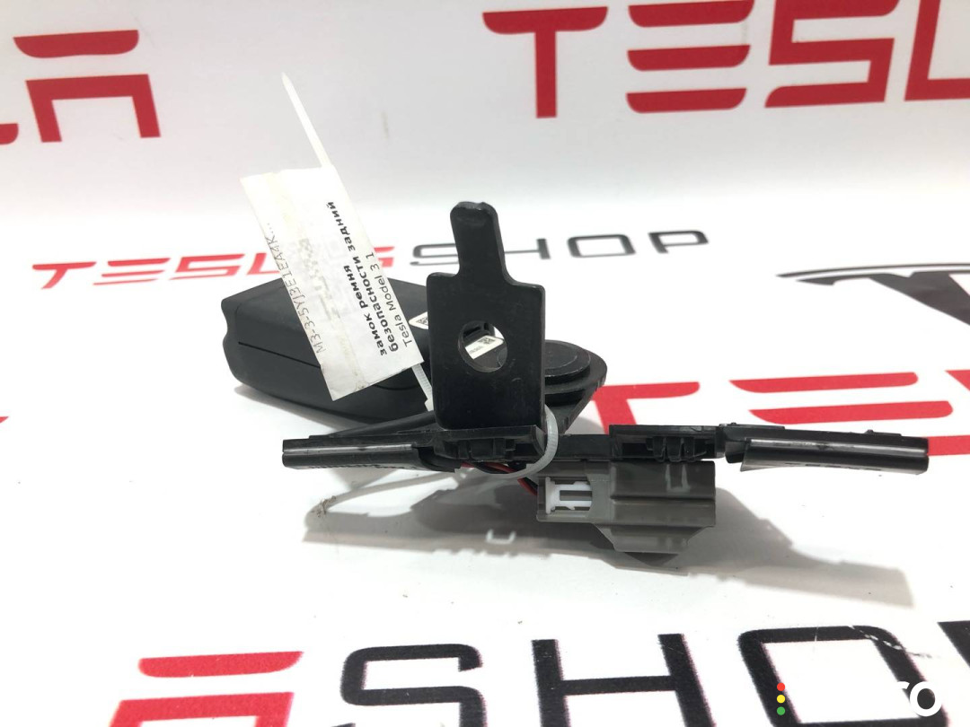 1085939-01-E Замок ремня безопасности задний левый Tesla Model 3 2019г. - фото №3