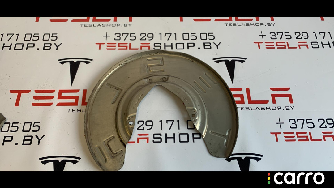 1044661-00-B Кожух тормозного диска Tesla Model 3 2019г. - фото №1