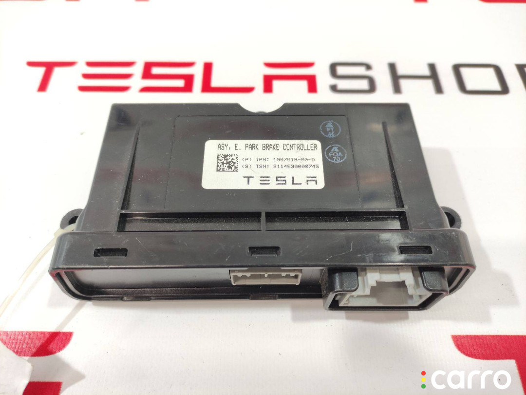 1007618-00-D ЭБУ электронного стояночного тормоза Tesla Model S 2012г. - фото №1