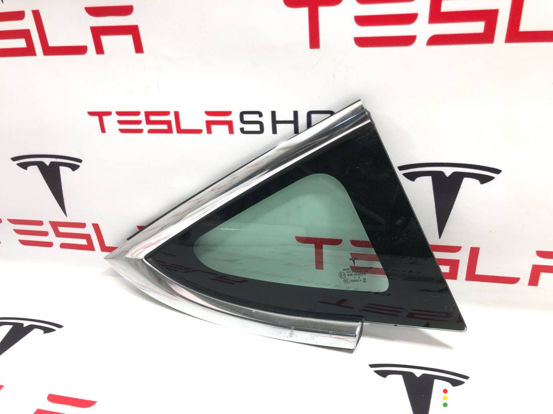 1080706-00-F, 1098758-00-G Форточка в заднее крыло Tesla Model 3 2019г. - фото №1