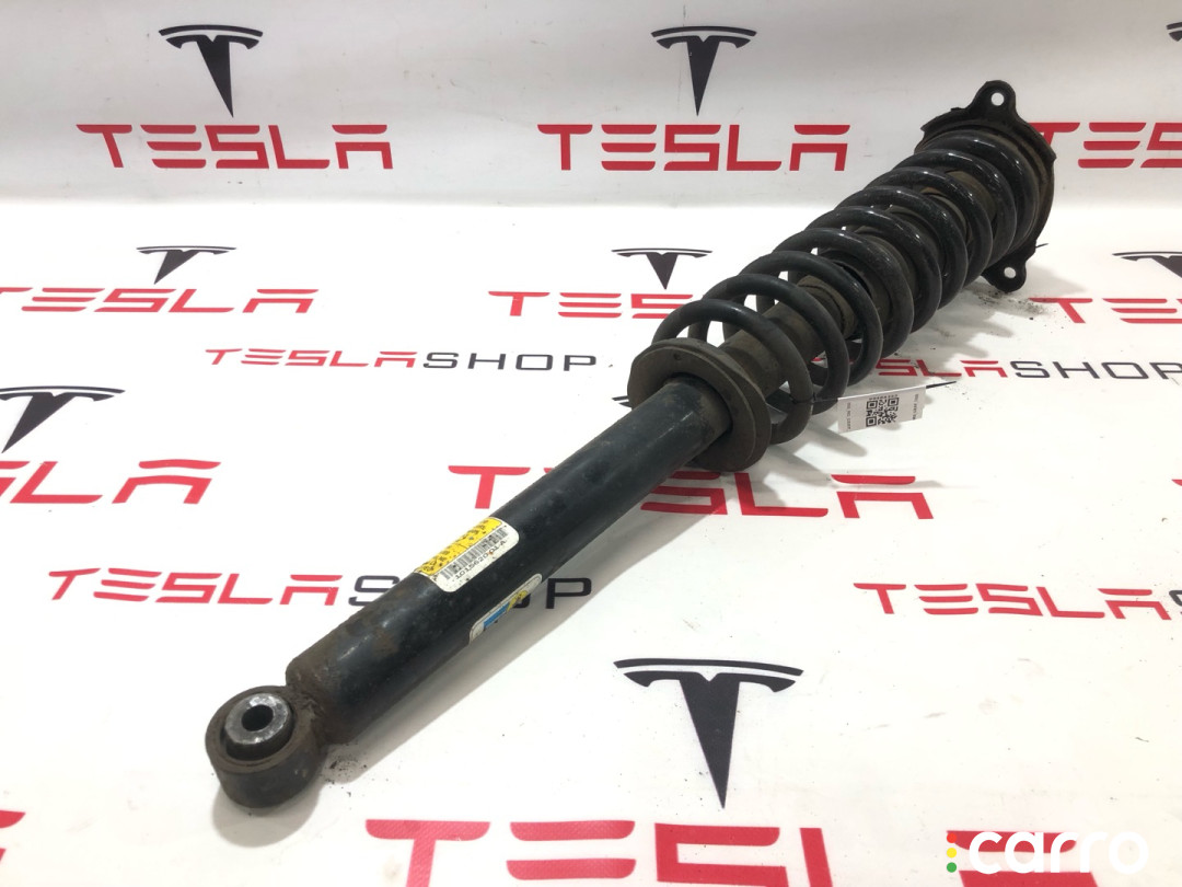 1015620-01-E стойка амортизатора задняя Tesla Model S 2013г. - фото №1