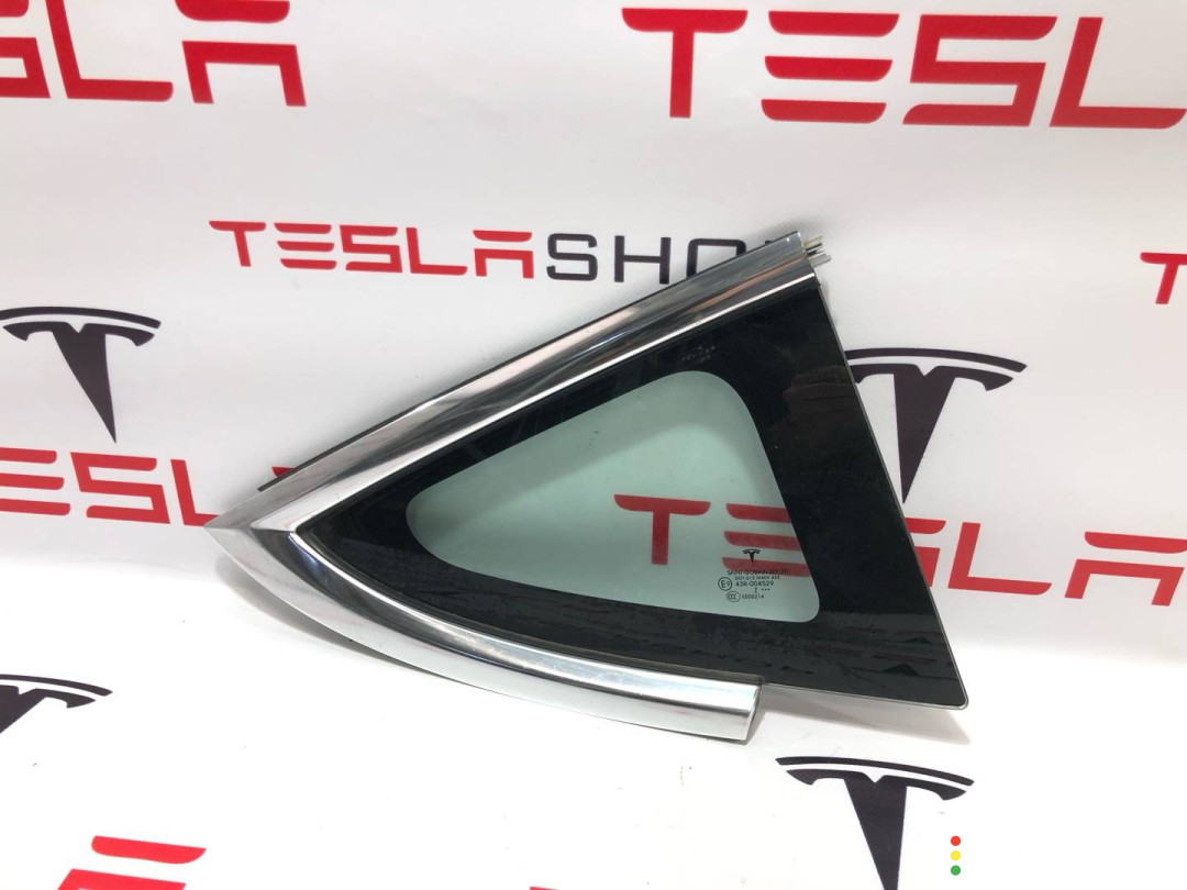 1080706-00-F, 1098758-00-G Форточка в заднее крыло Tesla Model 3 2019г. - фото №1