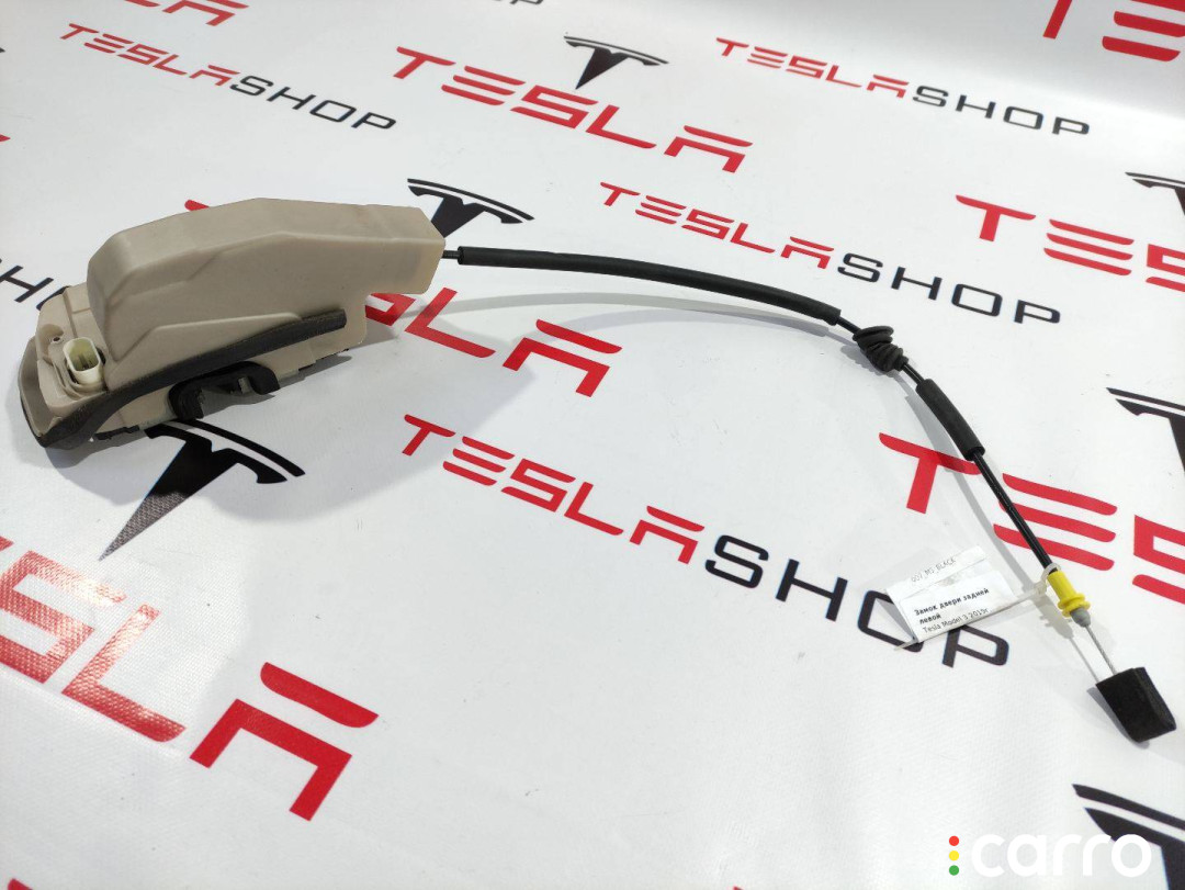 1500674-00-A, 1068970-99-E замок двери задней левой Tesla Model 3 2019г. - фото №1