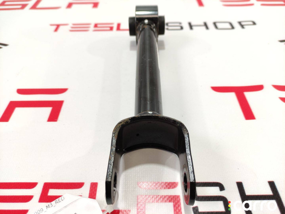 1044431-00-G Рычаг задний Tesla Model 3 2018г. - фото №1