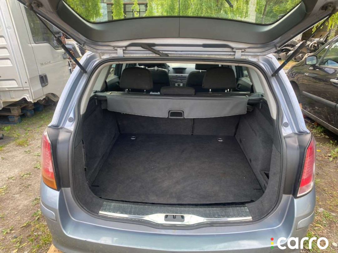 Обшивка багажника Opel Astra 2006г. - фото №1