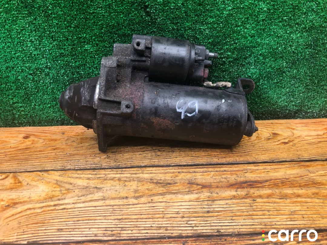 0001110115 Стартер Opel Astra 1999г. - фото №1
