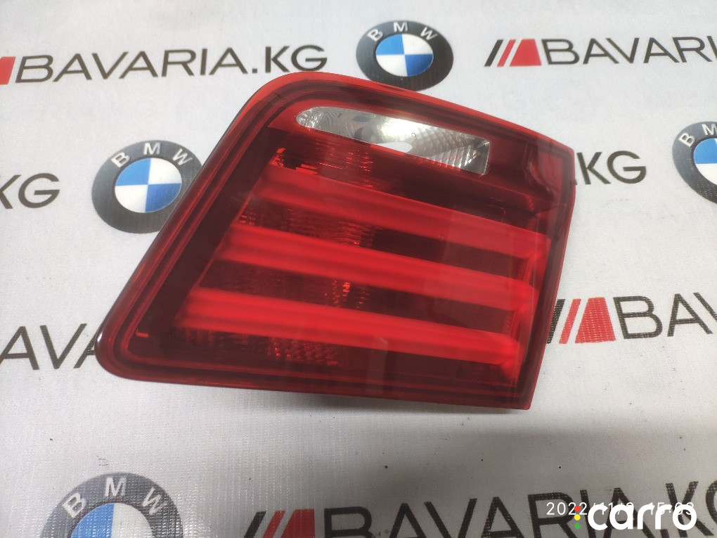 63217203226 Фонарь на багажной двери BMW 550i 2013г. - фото №2