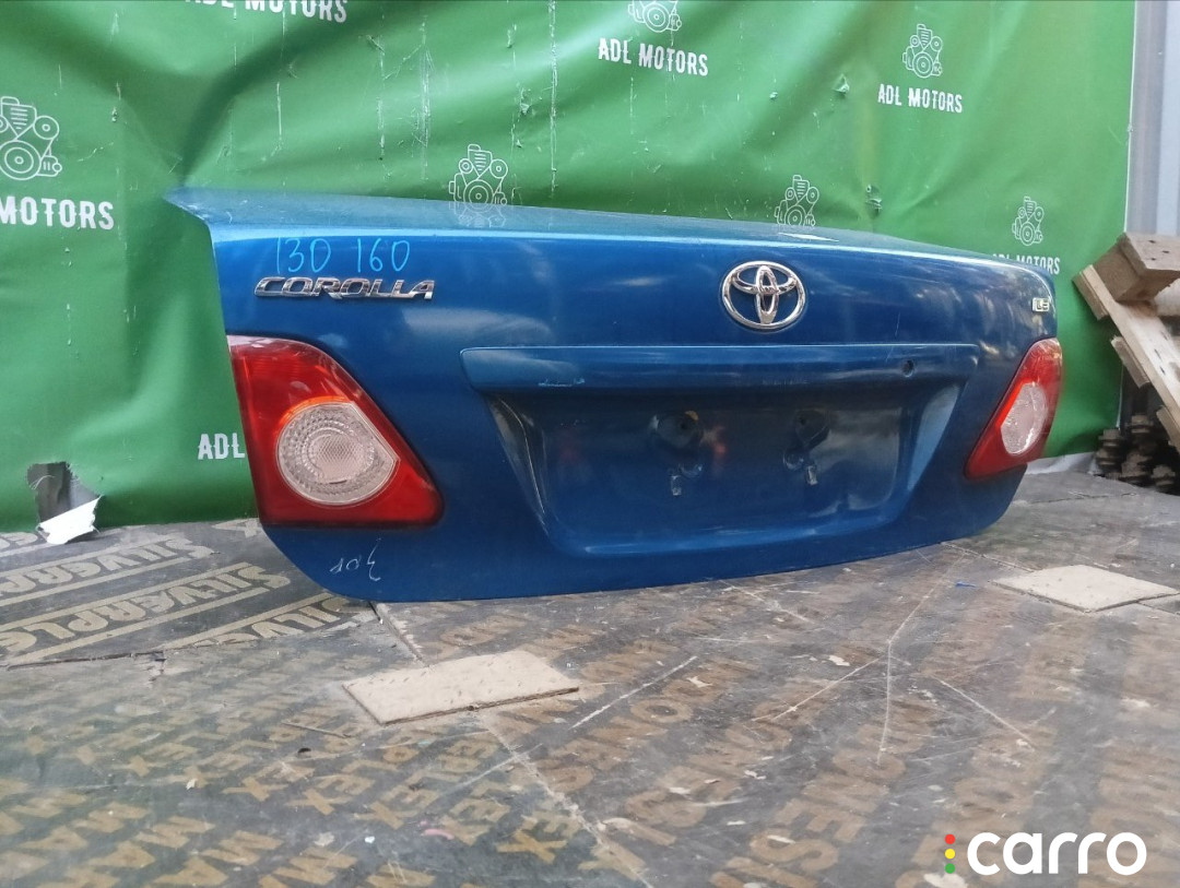 6440112B50, 6440112B30, 6440112C20, 8118700, L021020300, OEM0055BAG, STTY290750, TA03031, TCG00715B, TY12313BAX, TYCRL06600 Крышка багажника Toyota Corolla 2006г. - фото №6