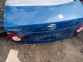 6440112B50, 6440112B30, 6440112C20, 8118700, L021020300, OEM0055BAG, STTY290750, TA03031, TCG00715B, TY12313BAX, TYCRL06600 Крышка багажника Toyota Corolla 2006г. - фото №10