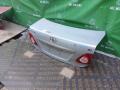 6440112B50, 6440112B30, 6440112C20, 8118700, L021020300, OEM0055BAG, STTY290750, TA03031, TCG00715B, TY12313BAX, TYCRL06600 Крышка багажника Toyota Corolla 2006г. - фото №3