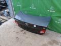 6440112B50, 6440112B30, 6440112C20, 8118700, L021020300, OEM0055BAG, STTY290750, TA03031, TCG00715B, TY12313BAX, TYCRL06600 Крышка багажника Toyota Corolla 2006г. - фото №3