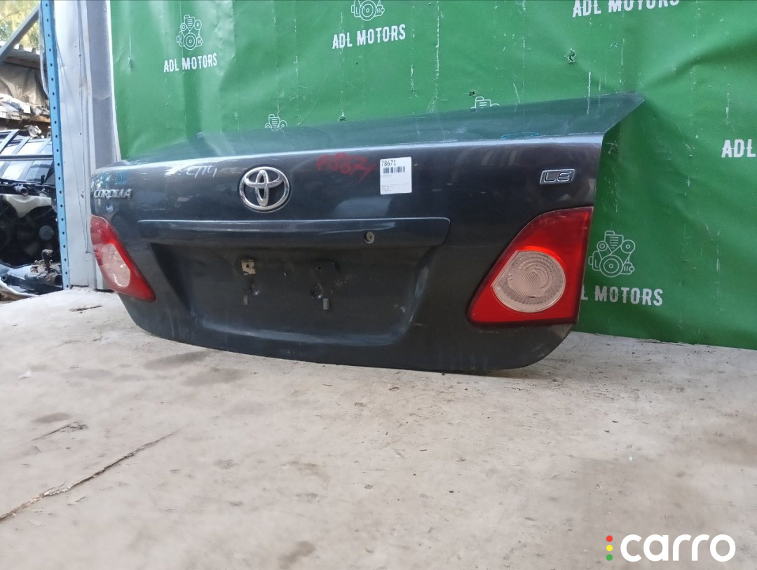 6440112B50, 6440112B30, 6440112C20, 8118700, L021020300, OEM0055BAG, STTY290750, TA03031, TCG00715B, TY12313BAX, TYCRL06600 Крышка багажника Toyota Corolla 2006г. - фото №4