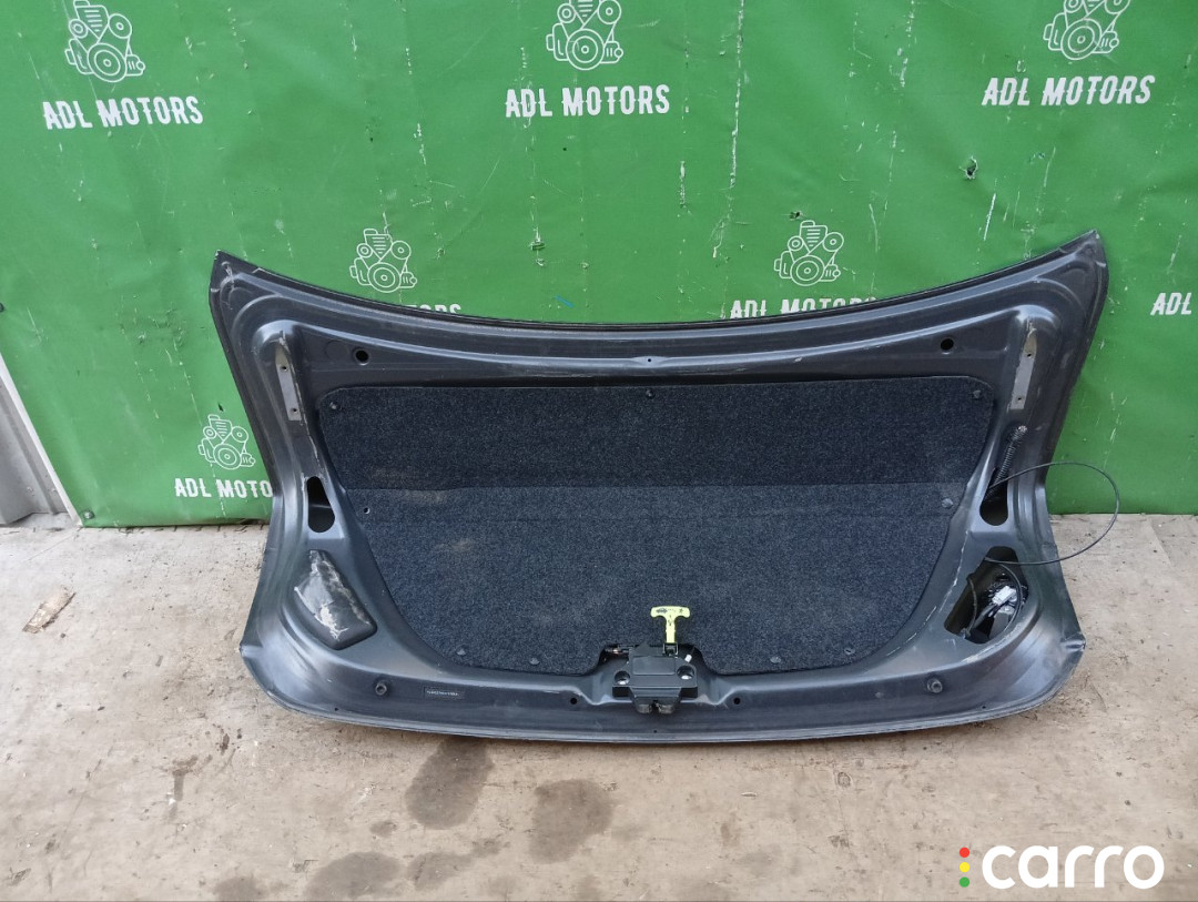 6440112B50, 6440112B30, 6440112C20, 8118700, L021020300, OEM0055BAG, STTY290750, TA03031, TCG00715B, TY12313BAX, TYCRL06600 Крышка багажника Toyota Corolla 2006г. - фото №7