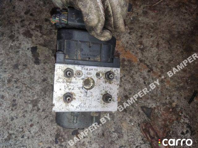0273000000, 265216733 Блок ABS Nissan Almera N16 2001г. - фото №1