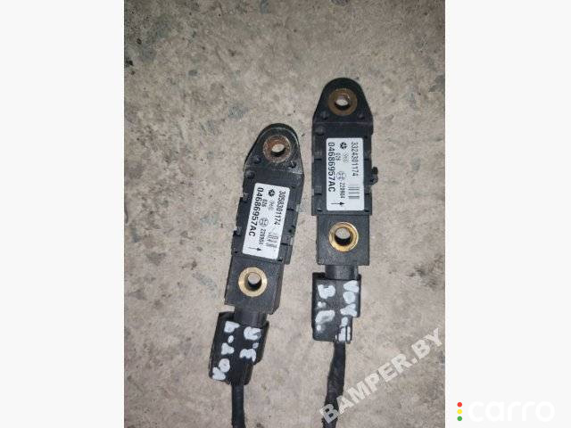04686957AC датчик удара Chrysler Voyager 4 2005г. - фото №1