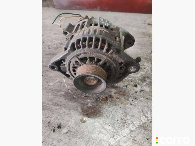 23100-BU010 Генератор Nissan Almera Tino V10 2004г. - фото №1