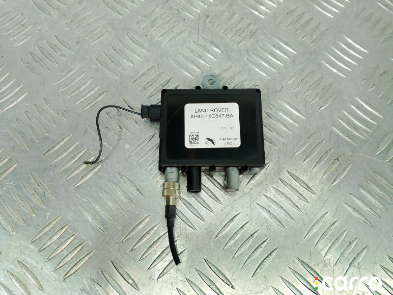 XUO000010, XH4218C847BA Усилитель антенны Land Rover Range Rover 2008г. - фото №1