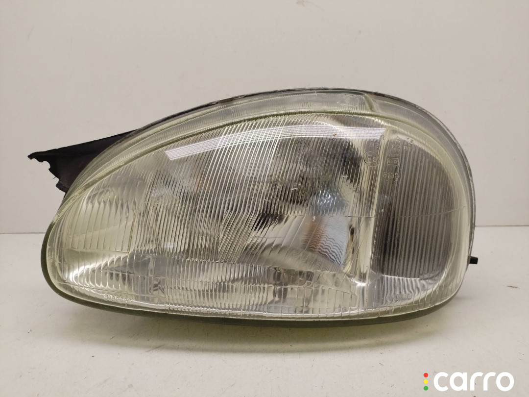 фара левая Opel Corsa B 2000г. - фото №1