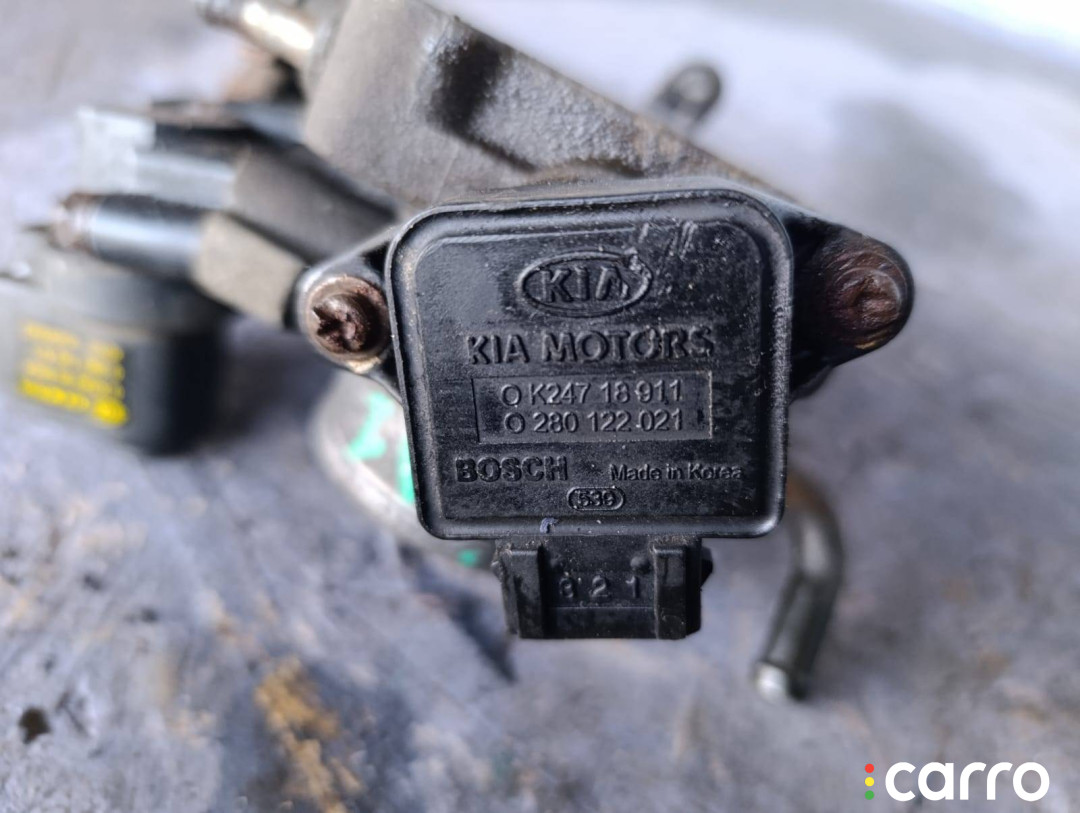 0K24718911, 0K9A220660A заслонка дроссельная Kia Shuma 2 2001г. - фото №9