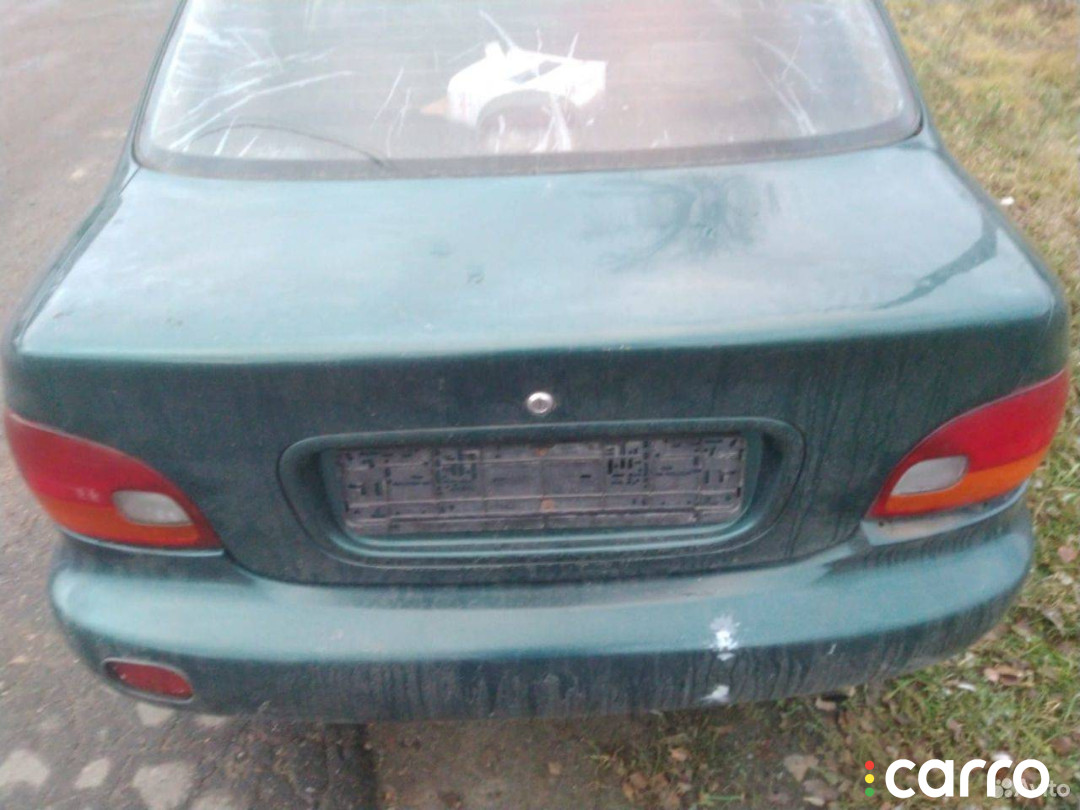 Крышка багажника (дверь 3-5) Hyundai Accent (X3) 1995г. - фото №1