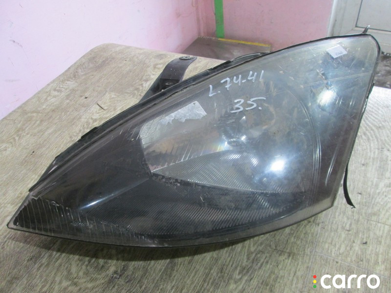 Фара левая Ford Focus 1 2000г. - фото №1