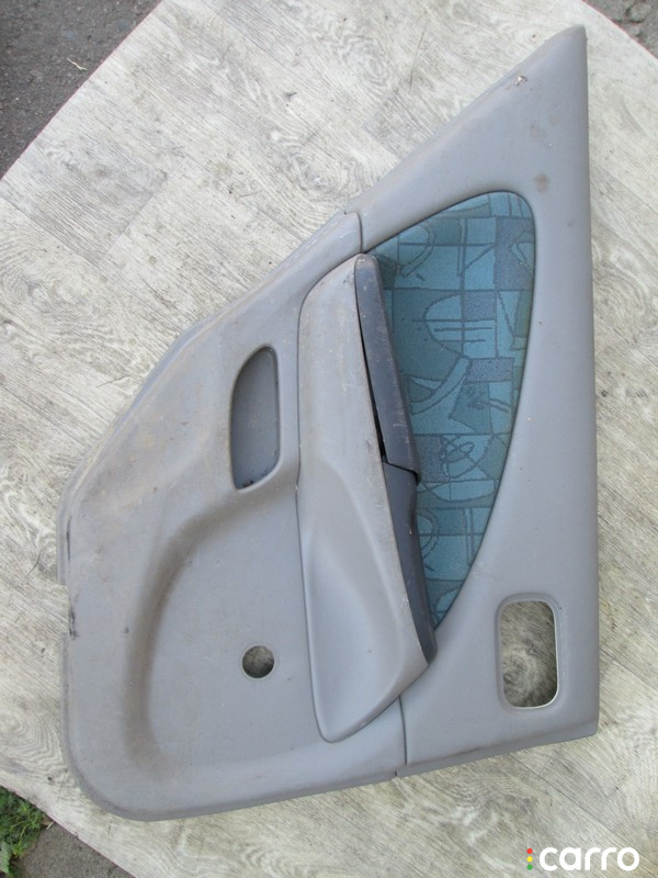 Обшивка двери задней левой (дверная карта) Nissan Almera N16 2000г. - фото №1