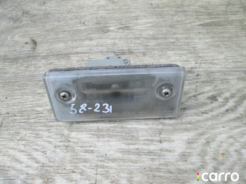 Подсветка номера Mazda 626 GE 1996г. - фото №1